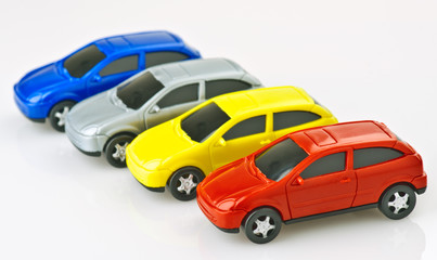 Fototapeta na wymiar toy cars made ​​of plastic