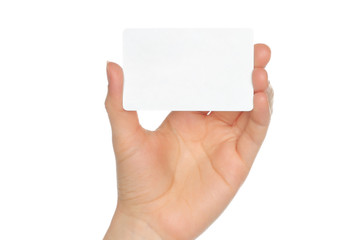 Hand holds charge card on white background .