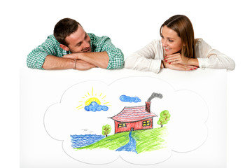 Young couple daydreaming of future house.