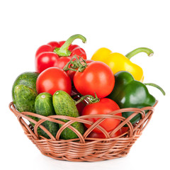 vegetables in basket isolated on a white background