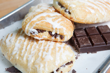 Chocolate croissants with icing