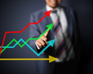 Business man touching growth graph of success
