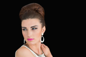 Woman made up in a sixties mod style