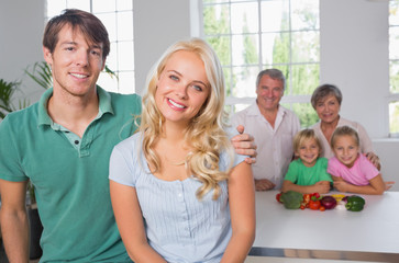 Portrait of couple with their family