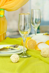 beautiful holiday table setting with lemons, close up