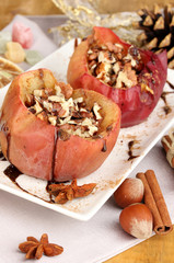 Baked apples on plate close up