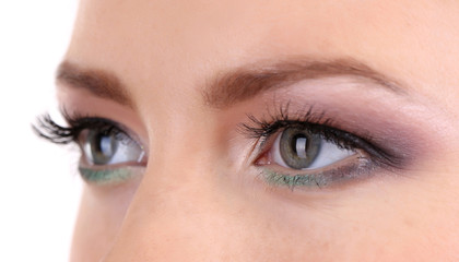 Fototapeta premium Beautiful female eyes with bright make-up, close up