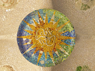 Ceiling with mosaic sun of Park Guell