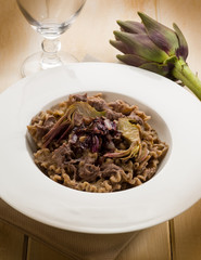 integral pasta with artichoke and chicory, vegetarian food