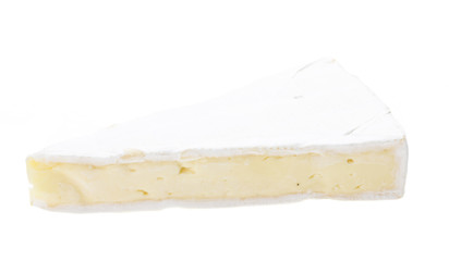 A piece of soft brie cheese