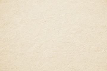 Mauer mit Strukturputz beige