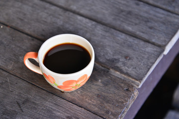 White Coffee Cup on a Wooden Table