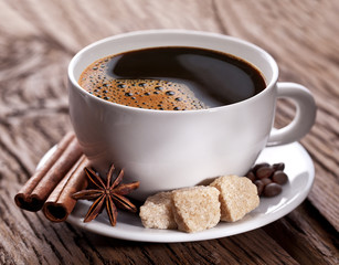 Cup of coffee with brown sugar.