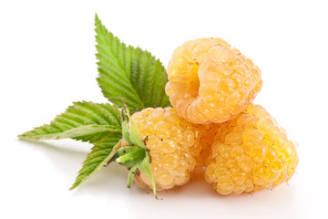 Yellow raspberries isolated on a white background.