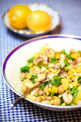 Squid salad with chickpeas, potatoes, parsley and lemon zest