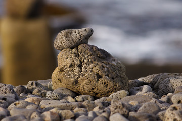 Fototapeta na wymiar In Iceland making small stone cairns is a popular form of folk art.