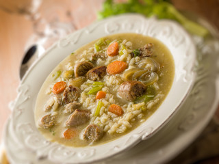 soup with rice and sausage, selective focus