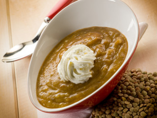 lentils cream soup with yogurt cream, vegetarian food
