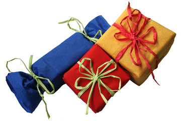 Three colorful presents on white background