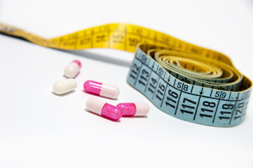 Diet - measuring tape and pills