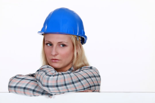 Serious woman in a hard hat