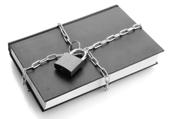 black book with chain, isolated on white