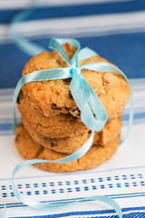 Stacked chocolate chip cookies on napkin