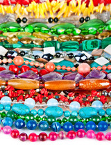 Fototapeta premium Lot of colored beads from different minerals and stone backgroun