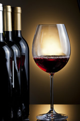 Bottles and glass of wine