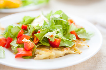 Potato pancakes with lettuce top