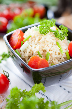 Cooked Brown Rice And Cherry Tomatoes