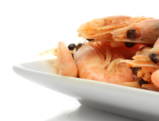 Boiled shrimps on plate, isolated on white