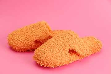 bright slippers, on pink background