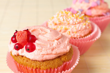 vanilla cupcakes with whipped cream