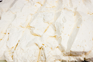 Full frame take of freshly produced cheese