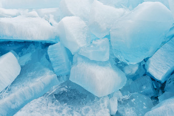 Blocks of pure ice in sunlight for background