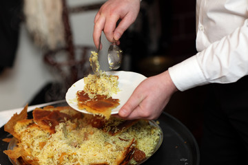 Chef putting Khan Pilaf