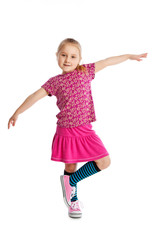 happy little child posing in studio