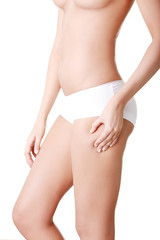 Beautiful female body isolated on white.