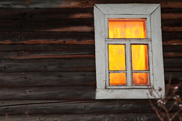 lighting window of rural log house