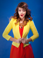 Fototapeta premium Colorful fresh portrait of a beautiful playful young woman