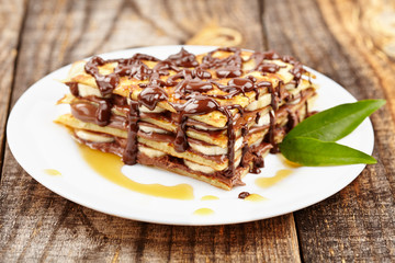 Pancakes with chocolate syrup