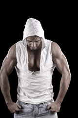 Obraz na płótnie Canvas muscled man on a black background