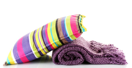 Warm plaid and color pillow, isolated on white