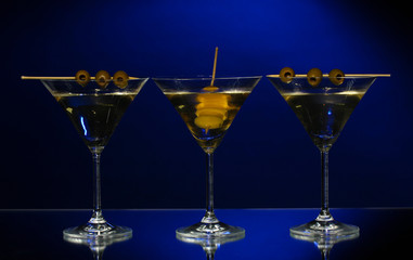 Martini glasses on dark background