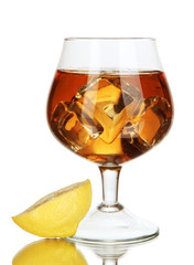 Glass of brandy with ice and lemon isolated on white