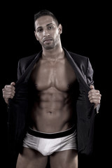 Fototapeta premium muscled man on a black background