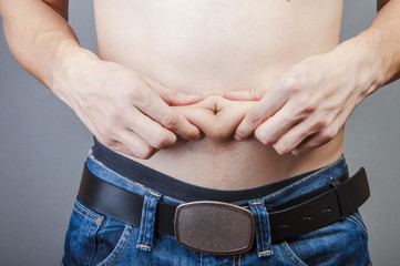 Naklejka premium Fat in stomach