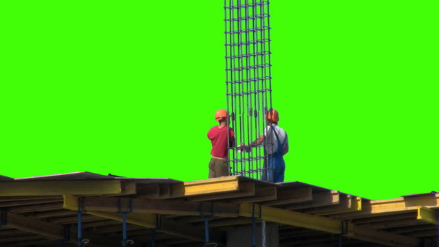 Two of the builder on a green screen