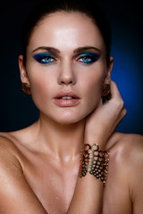 glamor sexy model with bright blue makeup